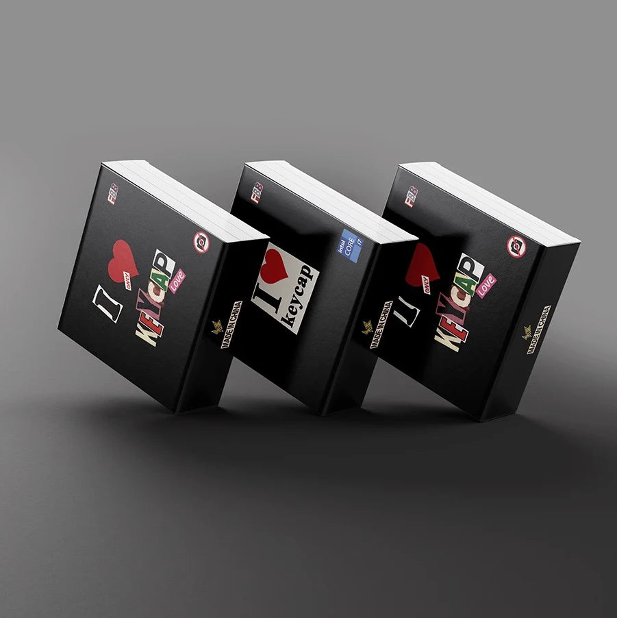 Three keycap sticker boxes with black packaging and colorful icons