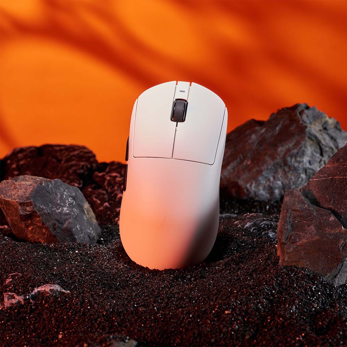 White gaming mouse, front view with scroll wheel and side button