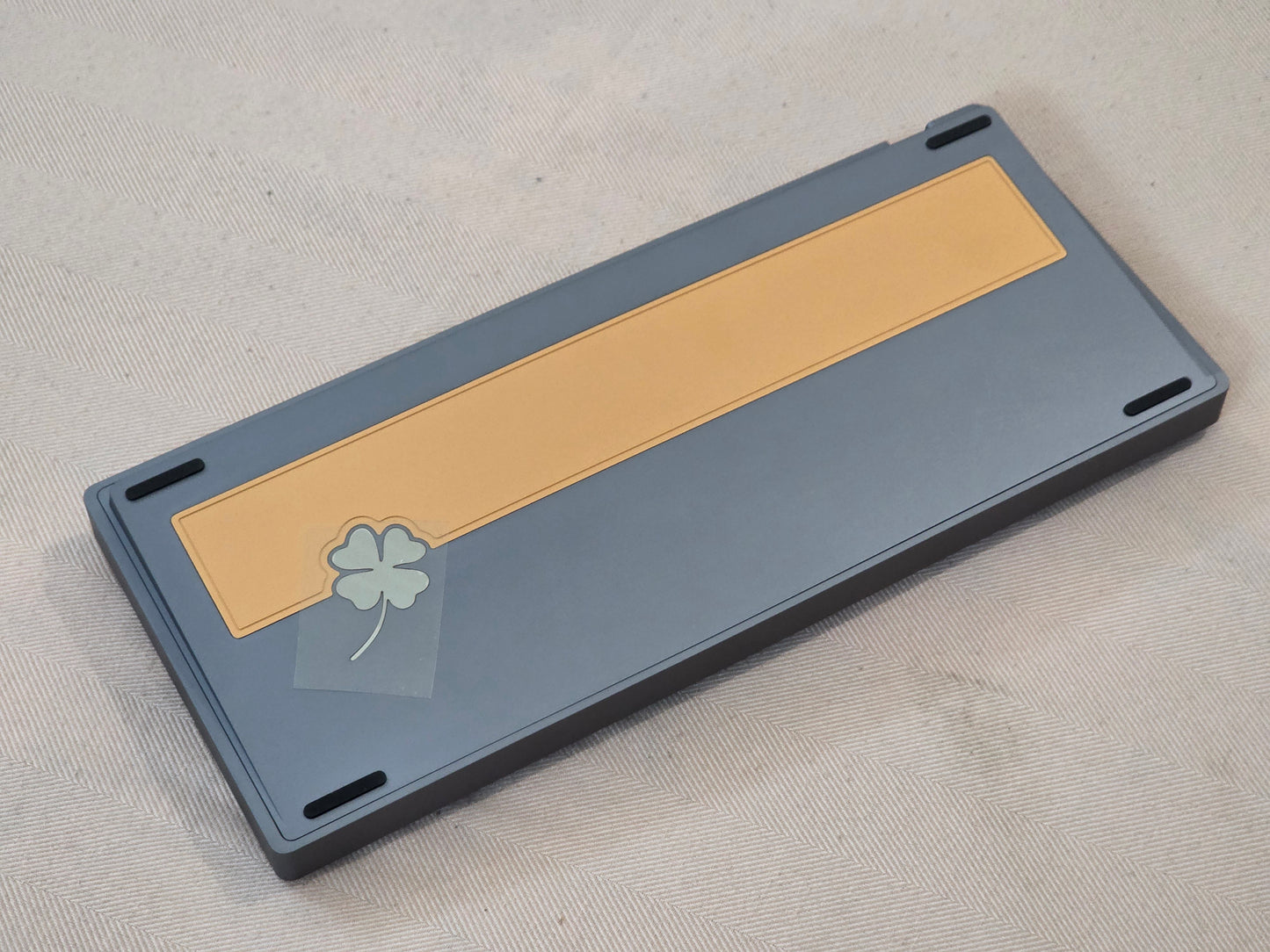 Wired keyboard case with yellow label insert and dark gray outer frame