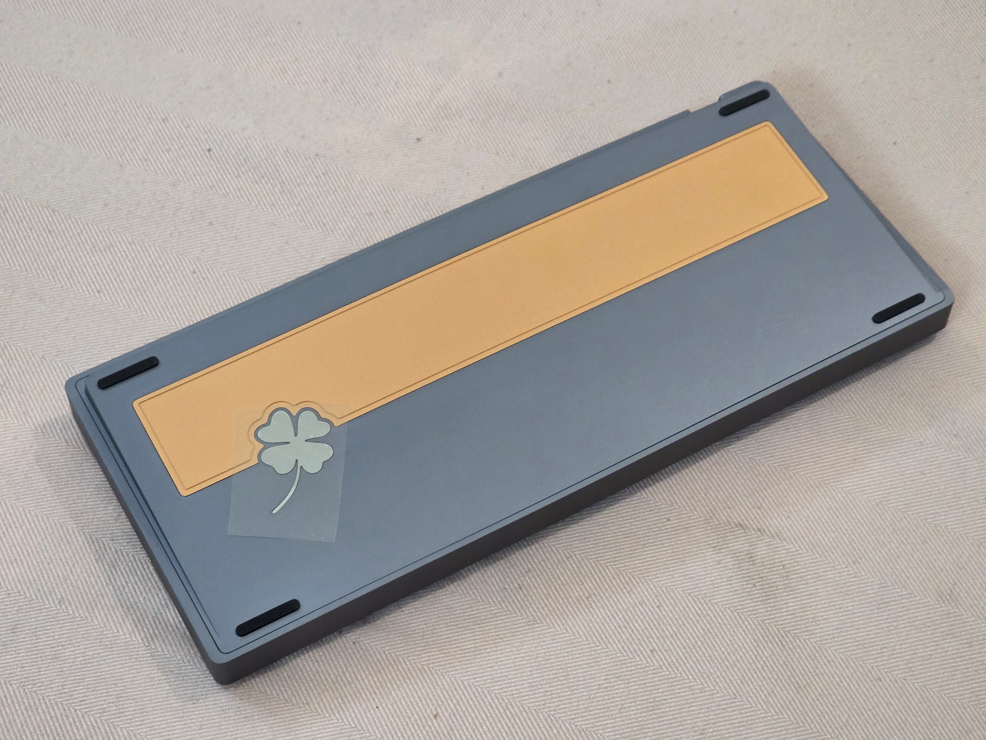 Wired keyboard case with yellow label insert and dark gray outer frame