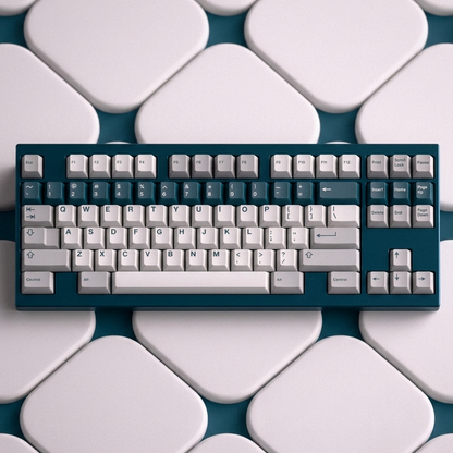 GMK Prussian Alert keycap close-up with light gray keys and blue labeled shortcuts