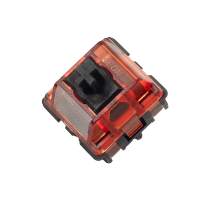 Mechanical key switch with red transparent housing and black cross stem