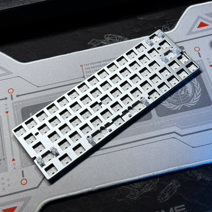 PCB module with long row of white switch sockets on a gray circuit board