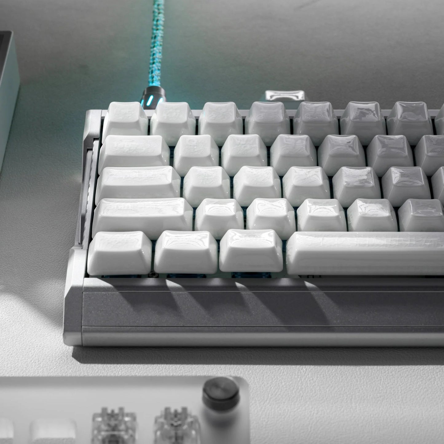 Row view of white crazed ceramic keyboard keycaps