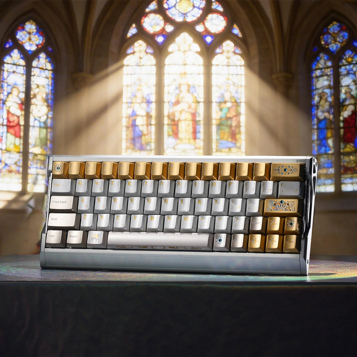 Stained-glass style keyboard keycaps: gold and silver caps in a metal display tray