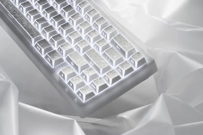 Close-up of prism forged carbon keycaps with illuminated white legends