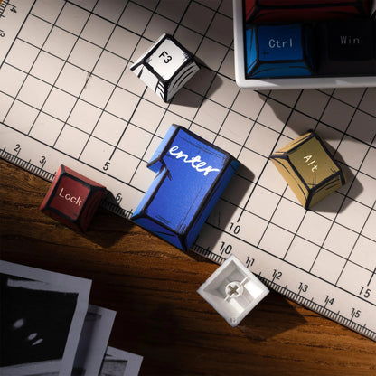Colored keycaps close-up, including blue Enter, gold Alt, and red Caps Lock