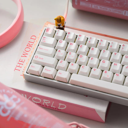 Glaze Ceramic keyboard with white keycaps and pink legends on a pink-and-gray base