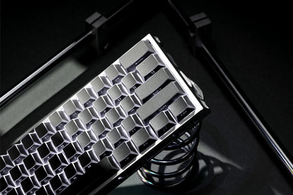 Metallic silver Prism Shadow keycap set with raised prism cube pattern