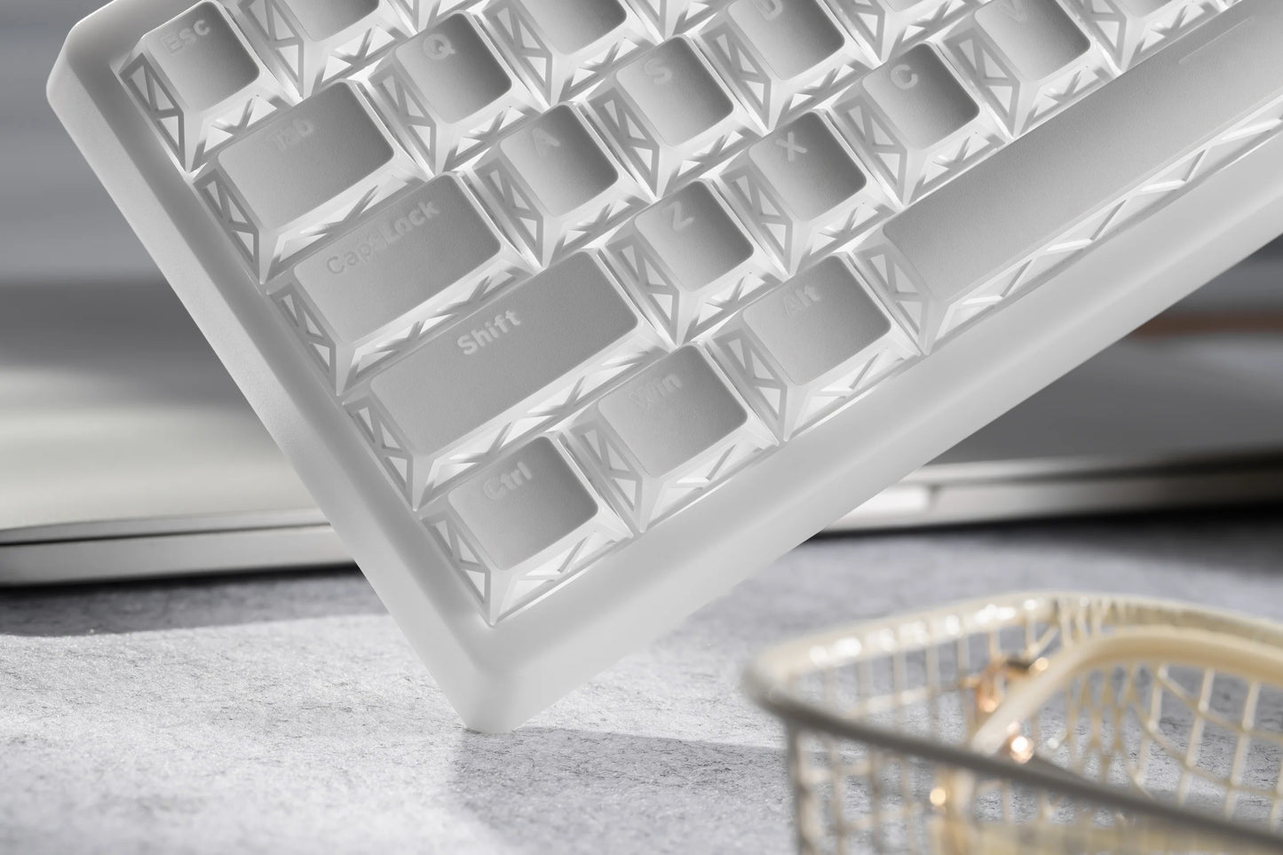 White prism refraction keyboard, close-up of sculpted keycap grid