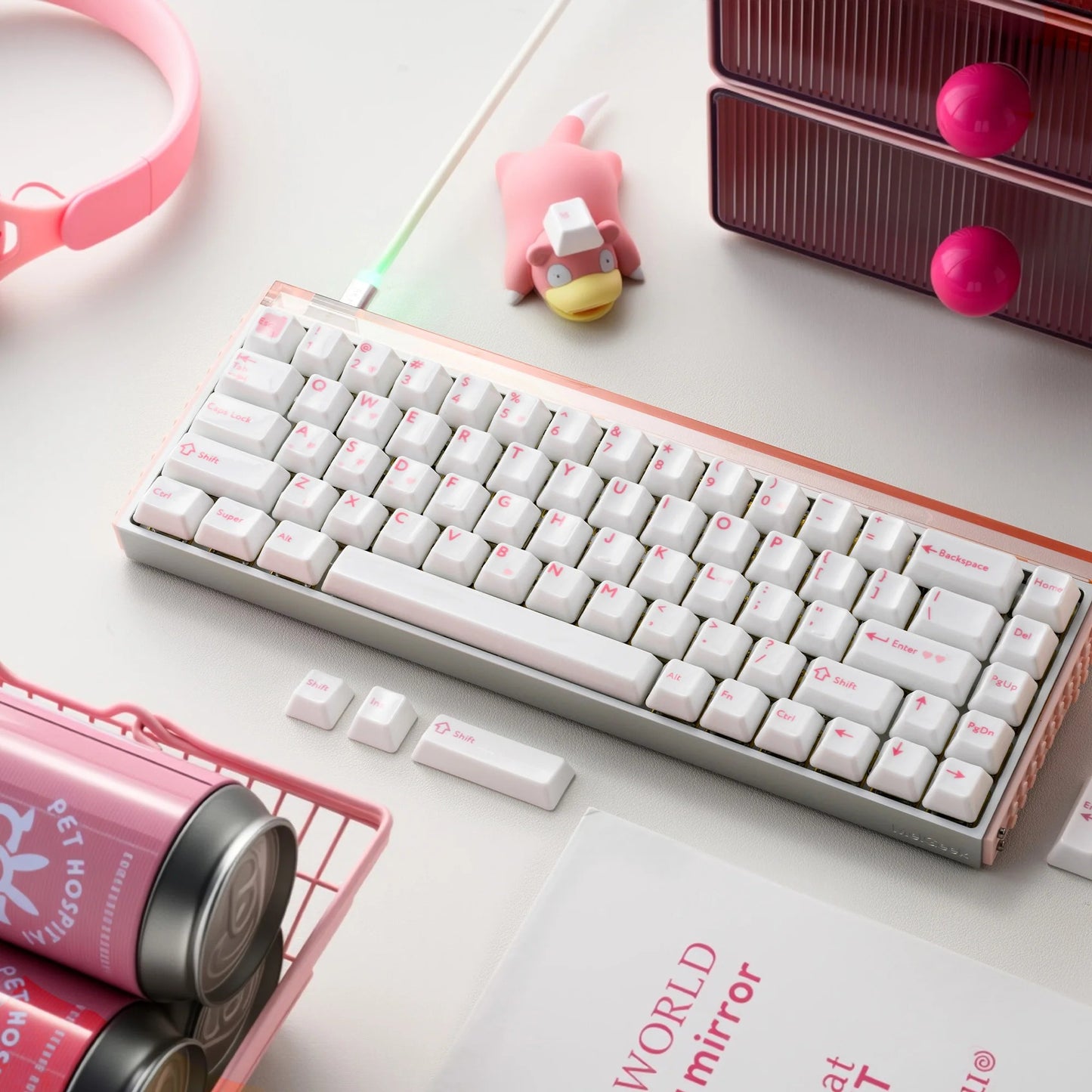 Glaze Ceramic keyboard with white keycaps and pink legends, angled top view