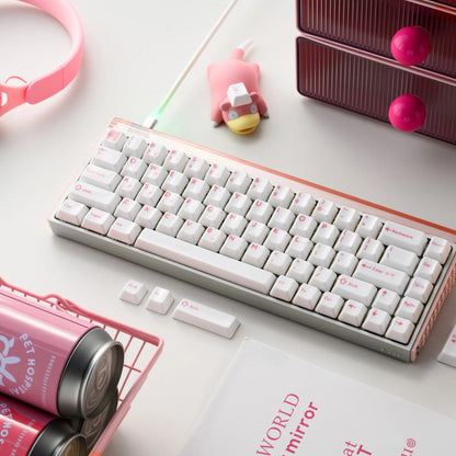 Glaze Ceramic keyboard with white keycaps and pink legends, angled top view
