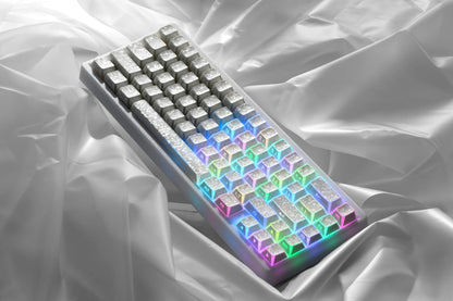Prism forged carbon keycaps with rainbow RGB glow and reflective silver textured tops