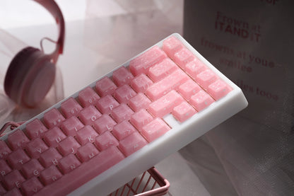 Pink mechanical keyboard keycaps with glossy stepped profiles
