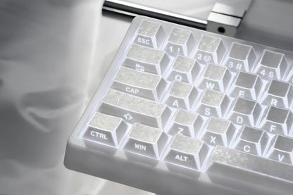Prism forged carbon keyboard keycaps showing Esc, Ctrl, Alt, and character legends