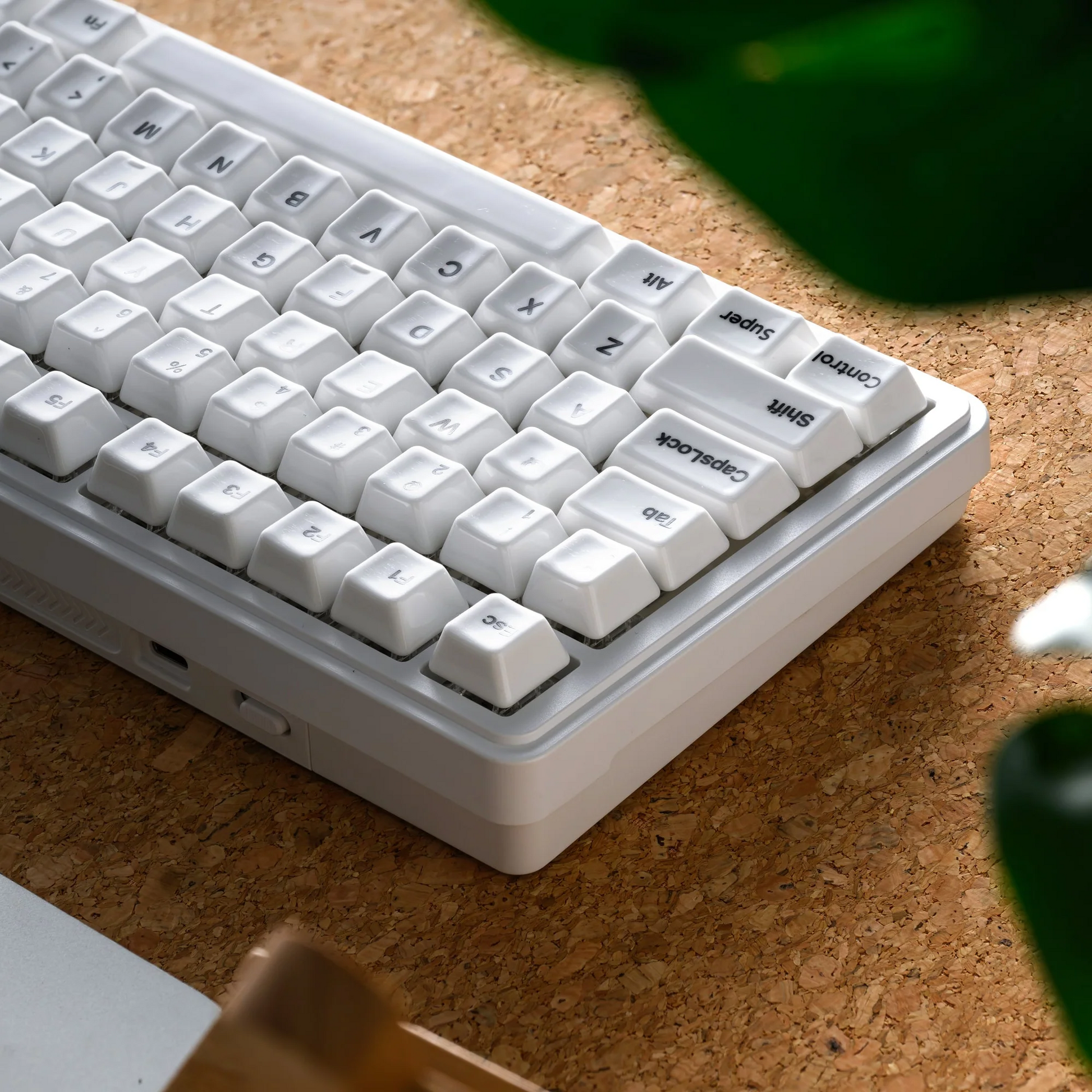 Glaze Ceramic keyboard with white keycaps and white legends on a light gray case