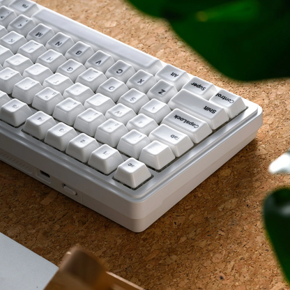 Glaze Ceramic keyboard with white keycaps and white legends on a light gray case
