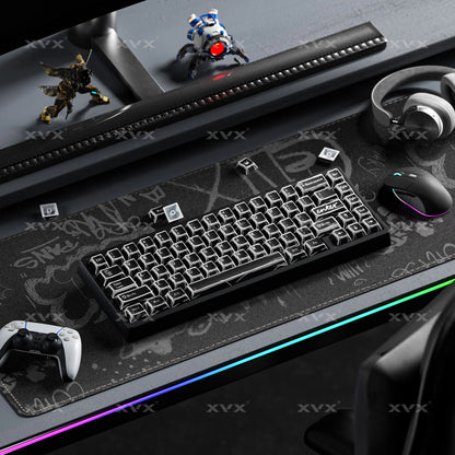 Black cherry-profile keycaps with white legends, shown at a keyboard angle
