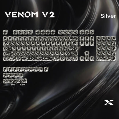 Silver keycap set with glossy black switches, labeled letters and symbols