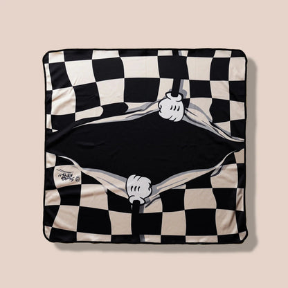 Checkered keyboard cloth with black-and-white squares and a cartoon hand motif