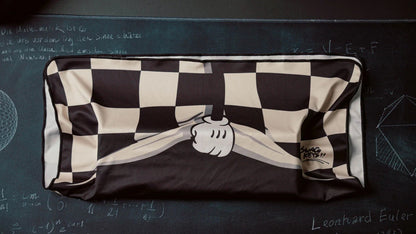 Rectangular keyboard cloth with black-and-white check pattern and cartoon hand graphic