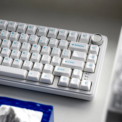 Glaze Ceramic keyboard close-up with white keycaps and light blue legends