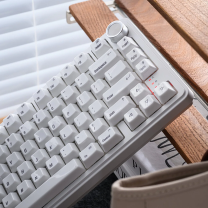 Glaze Ceramic keyboard with white keycaps and light blue legends on a gray base