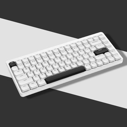 Low-profile keyboard with white keycaps and black base, shine-through legends