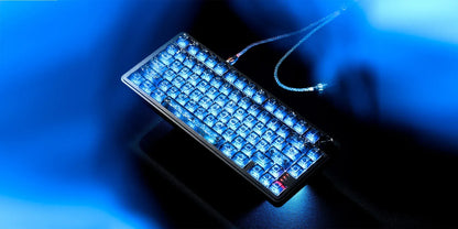 1-to-2 split fabric cable with braided cord and metal connectors near a lit keyboard