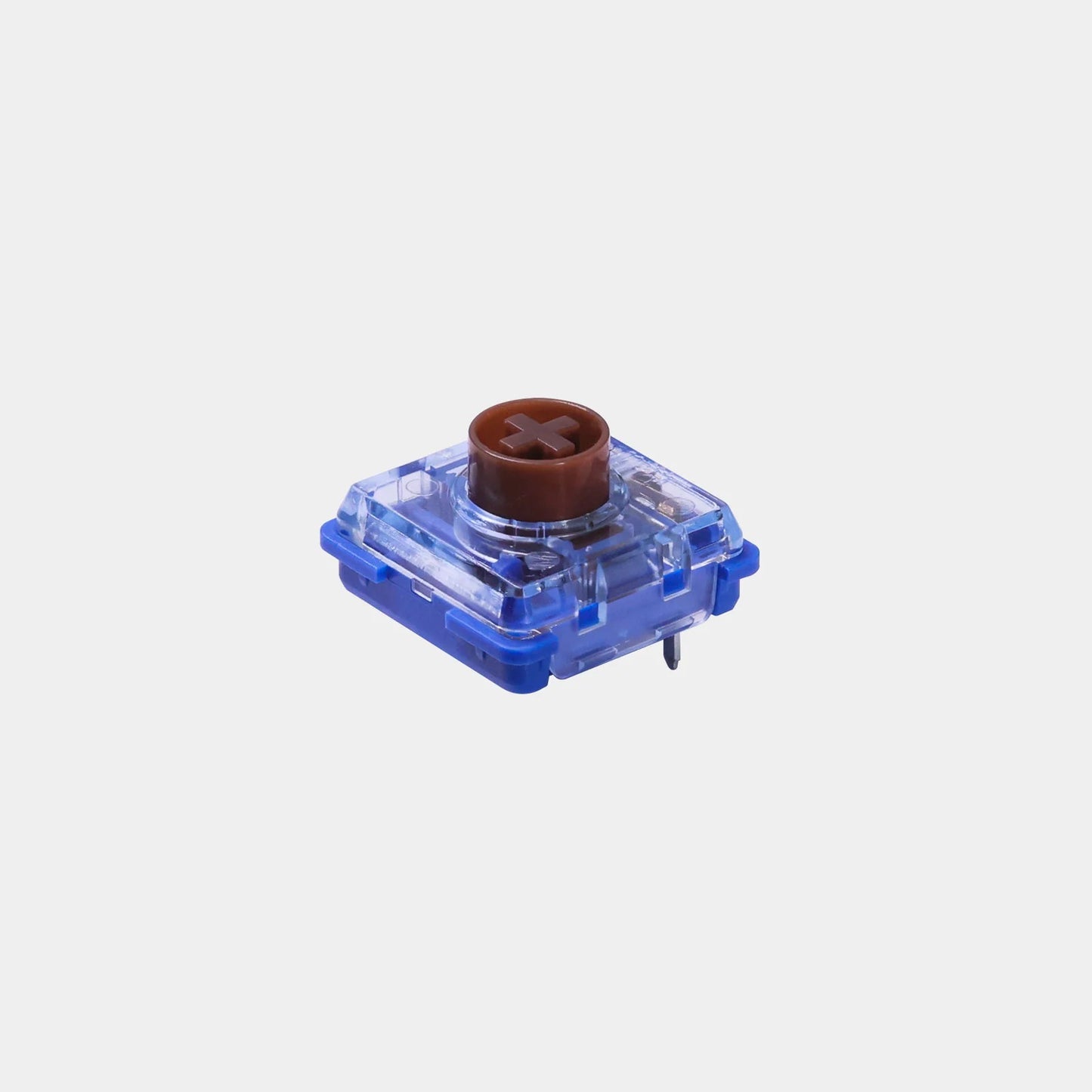 Low profile mechanical key switch with clear blue housing and brown cross stem