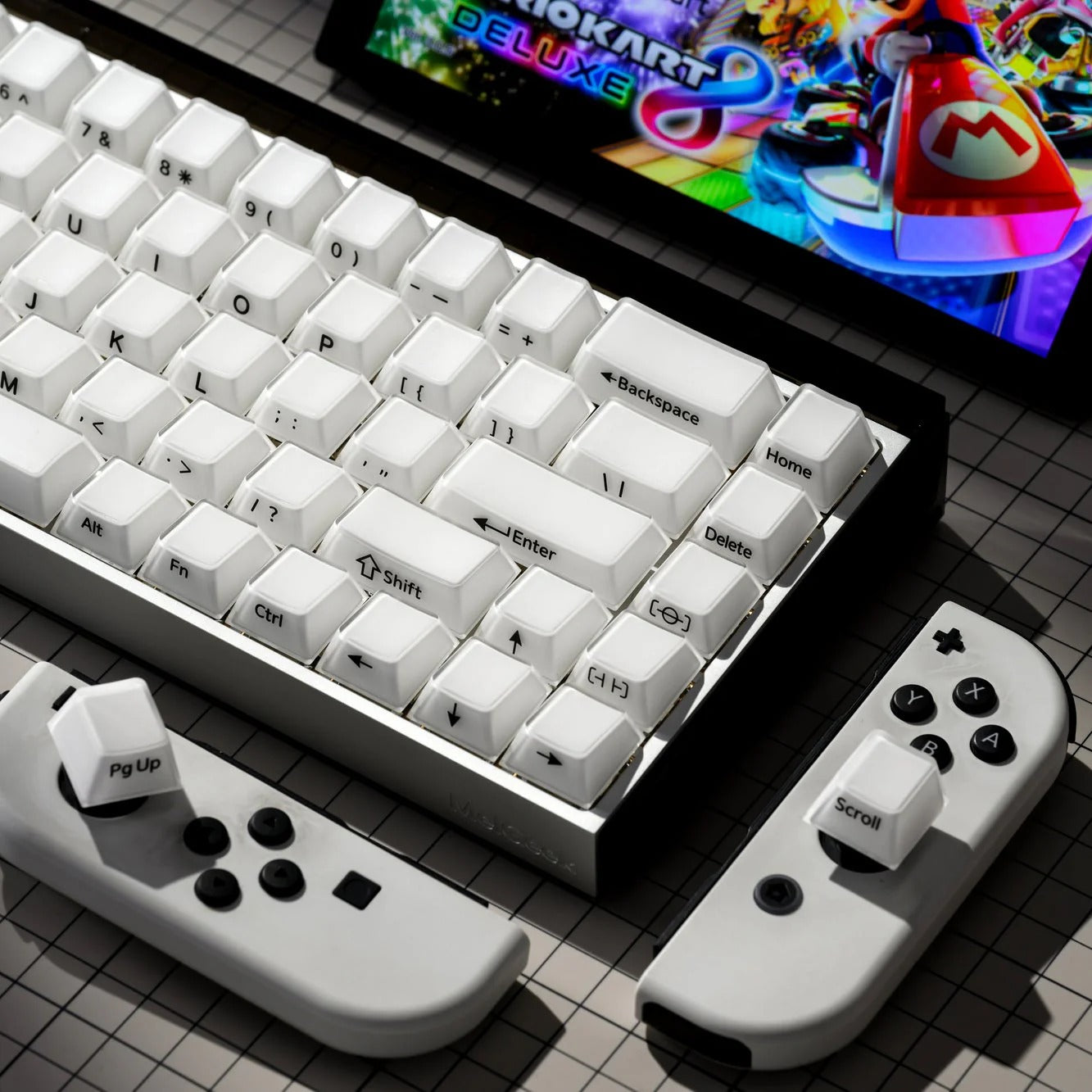 Mechanical keyboard with white keycaps and right-side media controls on a controller dock