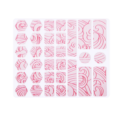 Pink grip tape pieces on backing sheet with swirl pattern